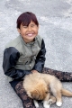 INUIT GIRL AND PUPPY