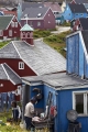 LOCAL INUIT FAMILY PREPARING TO BBQ FISH OUTSIDE