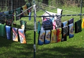 AUSSIE BEER MATS DRYING ON A HILLS HOIST